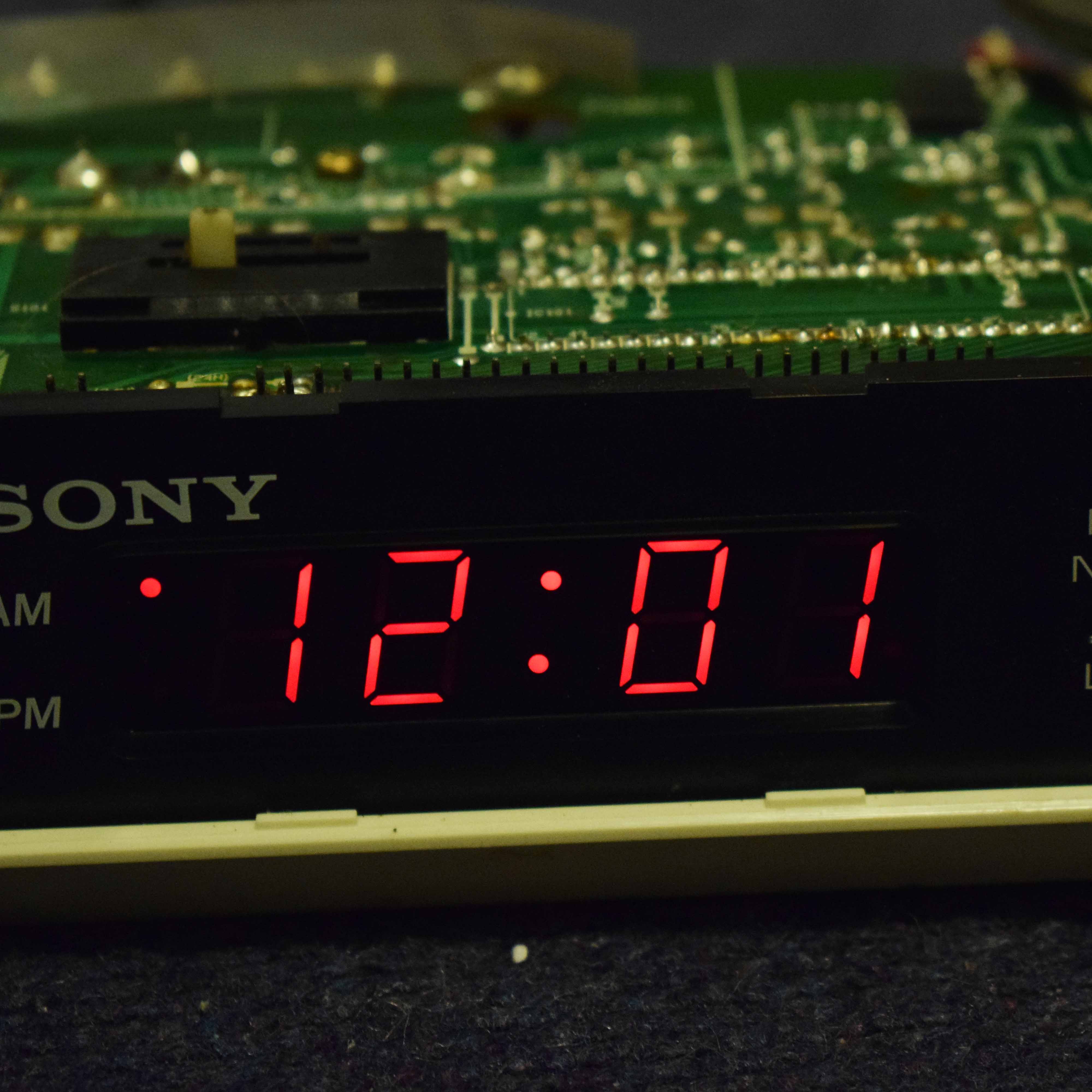 Photo of Sony Dream Machine ICF-C320L display lit up, dissasembled
