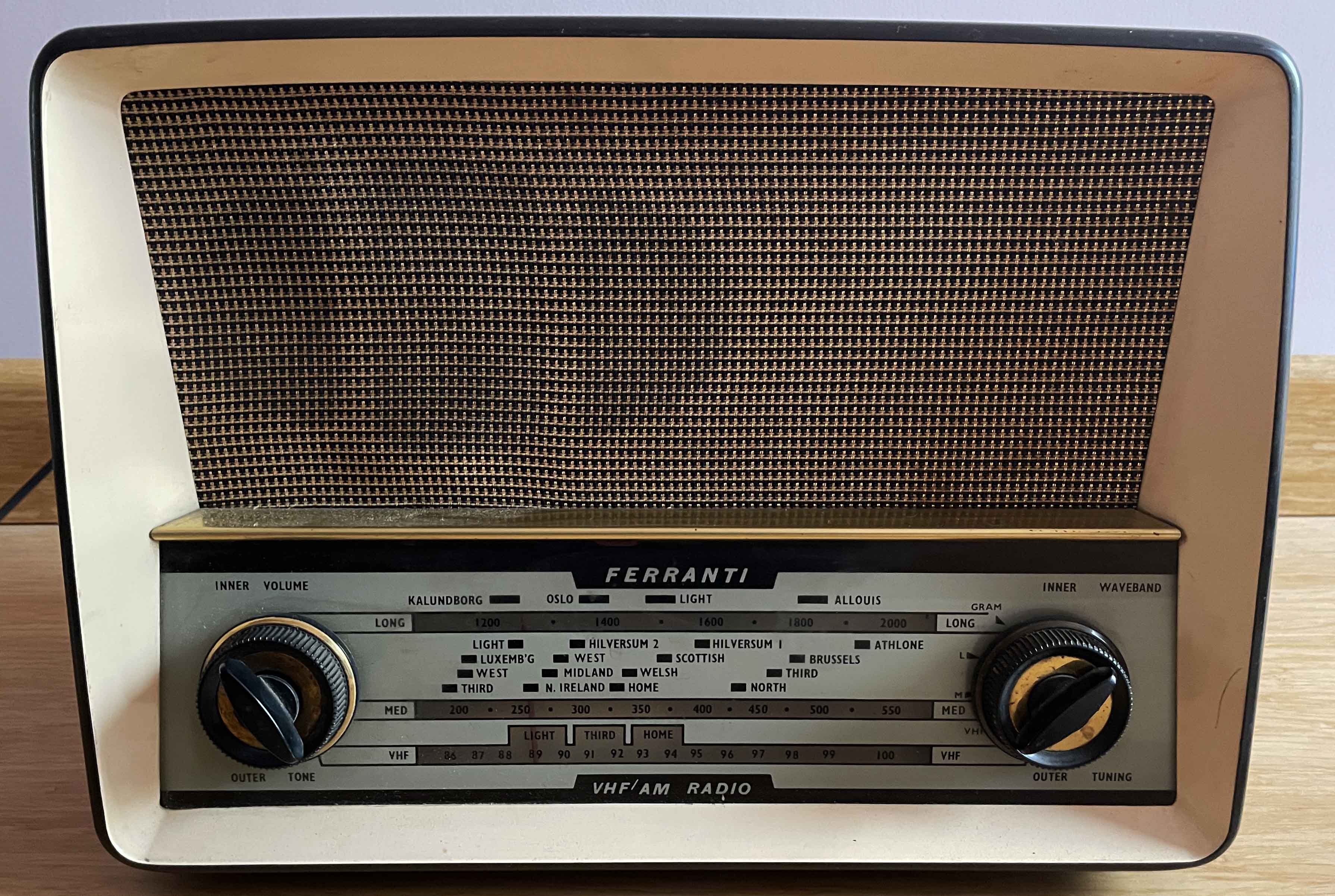 Image of the front showing the controls and speaker grill.