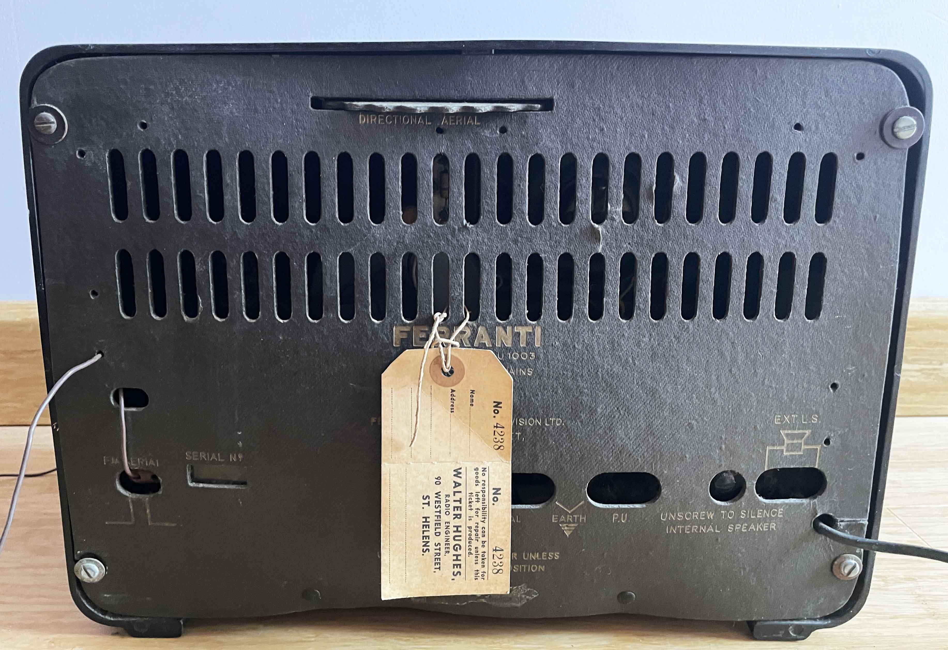 Image of the back showing panel with ports and adjustment dial.