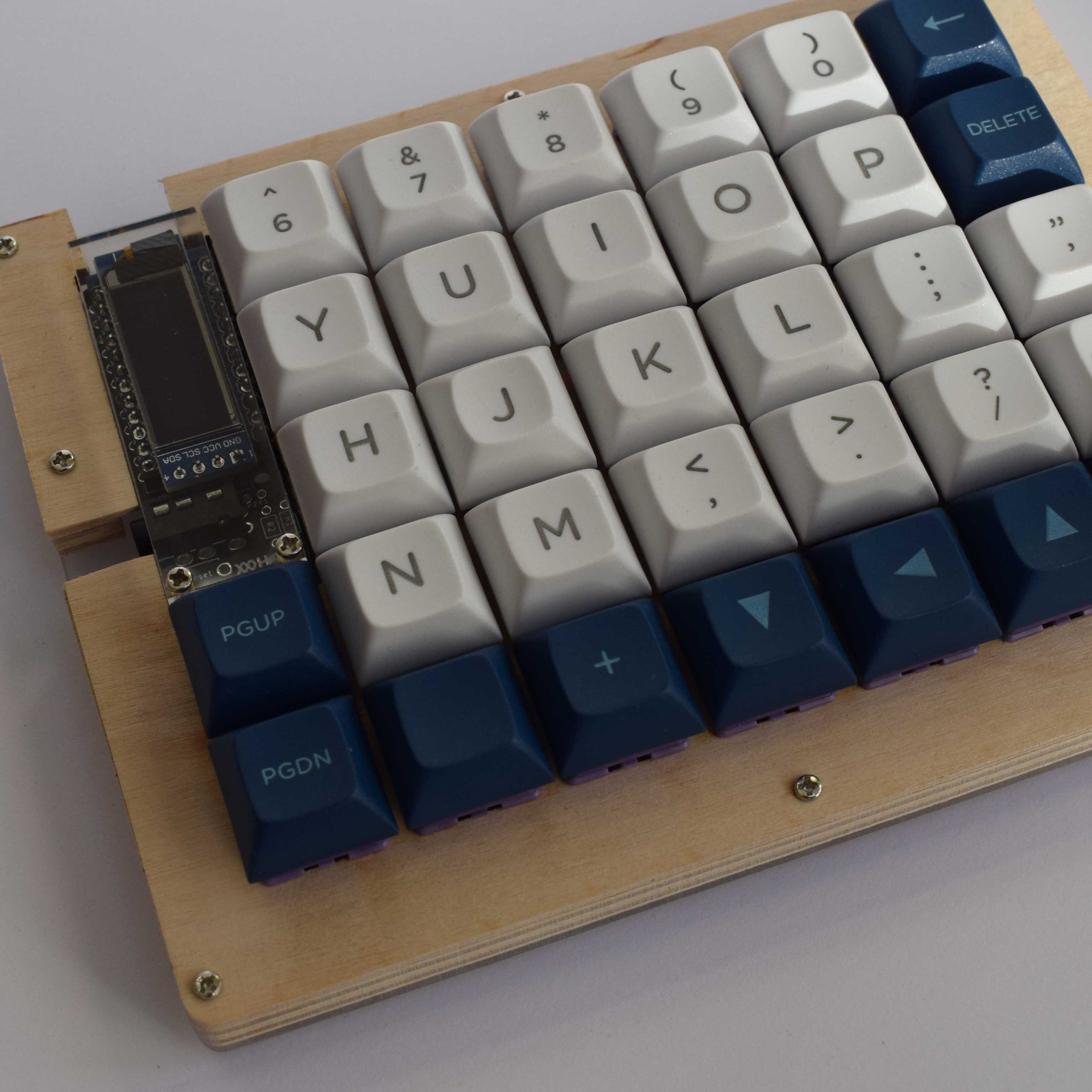 Mechanical keyboard with a wooden and acrylic case