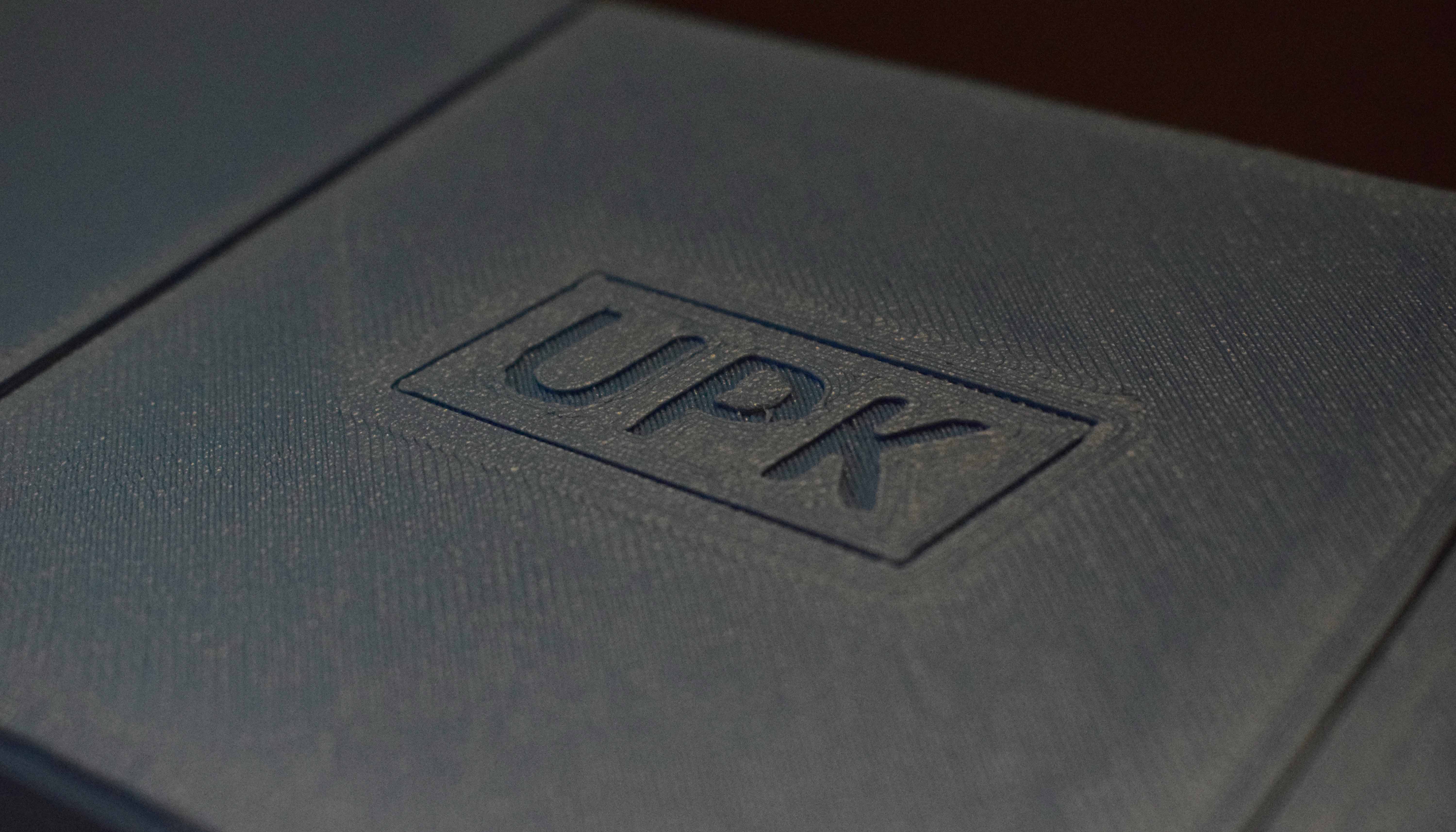 Close-up of underside showing UPK logo